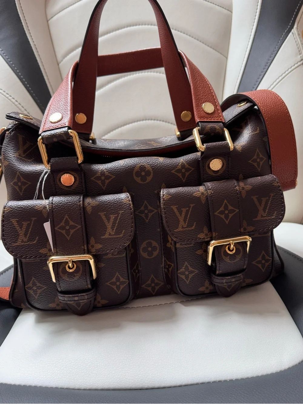 Louis Vuitton Monogram manhattan Canvas Messenger Bag with Brown Leather Trim